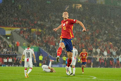 Dani Olmo celebrates after scoring Spain's 4th goal against Georgia 